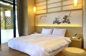 One fine day Jeju Poolvilla客房内的一张或多张床位