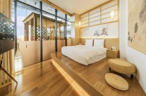 One fine day Jeju Poolvilla客房内的一张或多张床位
