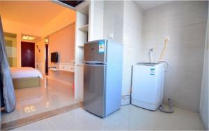 Kuchyň nebo kuchyňský kout v ubytování Nanning Qingzhou Rental Apartments