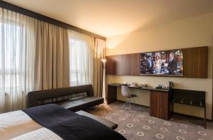 Uma TV ou centro de entretenimento em The Frankfurt