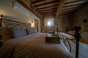 Posteľ alebo postele v izbe v ubytovaní Agriturismo Podere Tovari