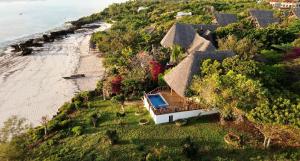 an aerial view of a house next to the beach at Zi Villa Main House in Matemwe