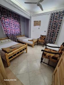 Un pat sau paturi într-o cameră la david hostel