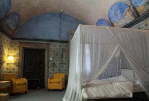 Postel nebo postele na pokoji v ubytování Hotel Cavour Et Des Officiers