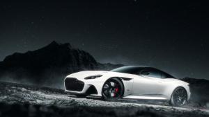 a white bugatti car parked on a hill at night at Chhetri Homestay in Rhenok