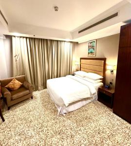 Кровать или кровати в номере Grand Legacy Hotel Doha