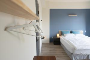Postel nebo postele na pokoji v ubytování WuYou Guesthouse