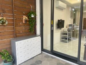 TV a/nebo společenská místnost v ubytování 黎明背包客棧Sunrise Backpackers Hostel