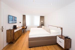 Postel nebo postele na pokoji v ubytování Hotel Storck