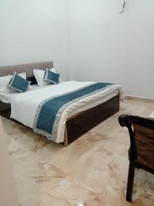 Katil atau katil-katil dalam bilik di RAVINDRA GEETA Inn