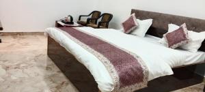 Katil atau katil-katil dalam bilik di RAVINDRA GEETA Inn