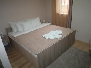 Letto o letti in una camera di Garni Hotel Tri O