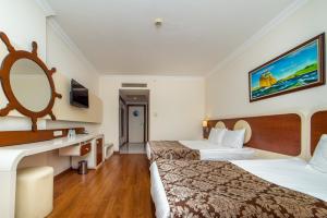 Ліжко або ліжка в номері Transatlantik Hotel & Spa - Ultra All Inclusive