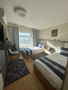 Khovuun hotel客房内的一张或多张床位