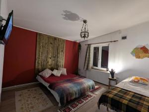 Postel nebo postele na pokoji v ubytování Casa CeDar