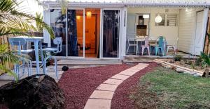 Zahrada ubytování LA PALMERAIE - Locations de Villas et Appartements