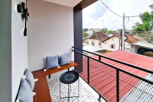 Μπαλκόνι ή βεράντα στο Urbanview Hotel Syariah Terra House Pati by RedDoorz