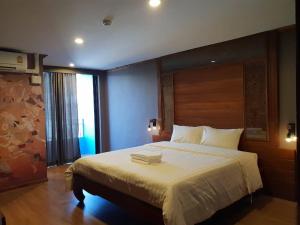 Postel nebo postele na pokoji v ubytování S48 Hotel