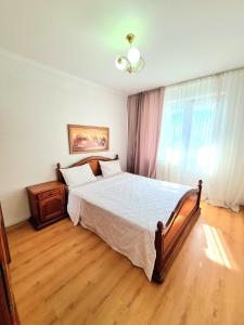 Postel nebo postele na pokoji v ubytování Apartament 2 bedrooms, Botanica