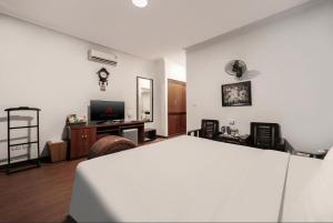 Μια τηλεόραση ή/και κέντρο ψυχαγωγίας στο A25 Hotel - 45B Giảng Võ
