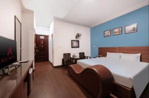 Ένα ή περισσότερα κρεβάτια σε δωμάτιο στο A25 Hotel - 45B Giảng Võ