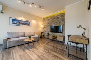 TV a/nebo společenská místnost v ubytování Malta Deluxe - AC - Parking - City View