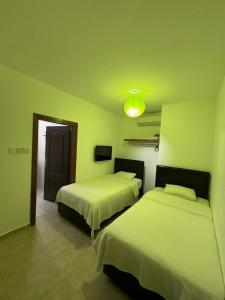 Postel nebo postele na pokoji v ubytování Betul Guest House