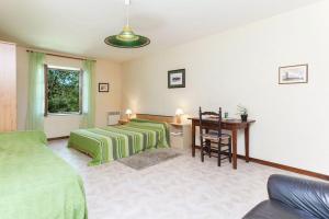 Postel nebo postele na pokoji v ubytování Maison avec un grand jardin en pleine nature