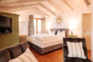 Posteľ alebo postele v izbe v ubytovaní Hubertus Boutiquehotel Filzmoos