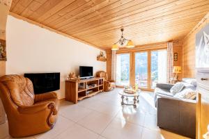 TV a/nebo společenská místnost v ubytování Tié No Appartement Chaleureux