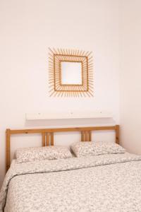 Posteľ alebo postele v izbe v ubytovaní Apartamento NUEVO con encanto en SAGRADA FAMILIA