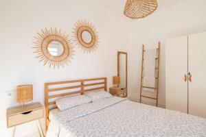 Posteľ alebo postele v izbe v ubytovaní Apartamento NUEVO con encanto en SAGRADA FAMILIA