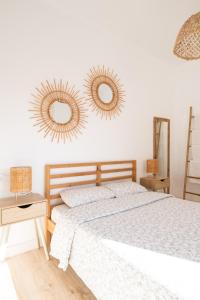 Posteľ alebo postele v izbe v ubytovaní Apartamento NUEVO con encanto en SAGRADA FAMILIA