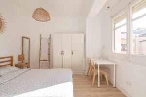 Posteľ alebo postele v izbe v ubytovaní Apartamento NUEVO con encanto en SAGRADA FAMILIA