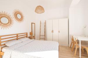 Posteľ alebo postele v izbe v ubytovaní Apartamento NUEVO con encanto en SAGRADA FAMILIA