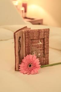 Katil atau katil-katil dalam bilik di Ayuda Sanctuary Wellness Boutique