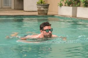 Kolam renang di atau dekat dengan Ayuda Sanctuary Wellness Boutique