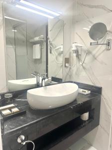 Ванная комната в Grand Legacy Hotel Doha