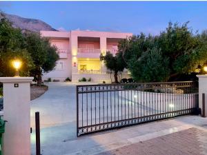 a house with a gate in front of it at Waterfront Apartments - Tucepi in Tučepi