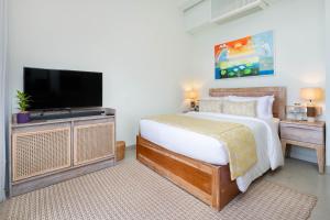 Televisyen dan/atau pusat hiburan di Ayuda Sanctuary Wellness Boutique