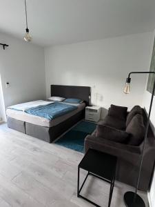 Ένα ή περισσότερα κρεβάτια σε δωμάτιο στο Forststrasse Apartment