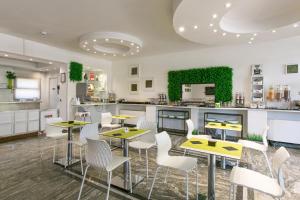 Kuchyň nebo kuchyňský kout v ubytování Hotel Boomerang Roma