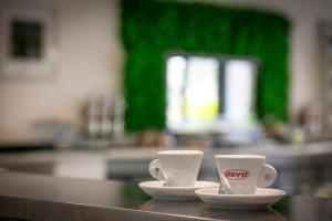 Příslušenství pro přípravu čaje a kávy v ubytování Hotel Boomerang Roma