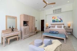 Katil atau katil-katil dalam bilik di Ayuda Sanctuary Wellness Boutique