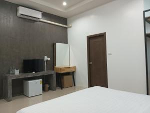 Postel nebo postele na pokoji v ubytování 22 Twenty-Two Hotel ทะเวนตี้-ทู โฮเทล