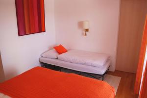 Postel nebo postele na pokoji v ubytování Hotel Gästehaus Neubauer