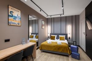 Postel nebo postele na pokoji v ubytování Platinia Premium Apartments