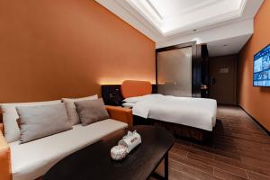 Cama o camas de una habitación en Super Time Monster Esports Hotel Shenzhen Nanshan Subway Station Branch