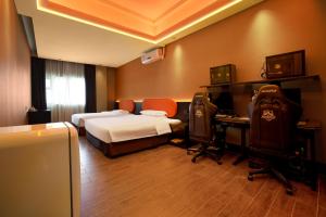 Cama o camas de una habitación en Super Time Monster Esports Hotel Shenzhen Nanshan Subway Station Branch