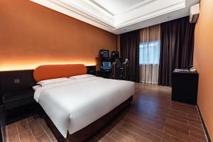 Cama o camas de una habitación en Super Time Monster Esports Hotel Shenzhen Nanshan Subway Station Branch